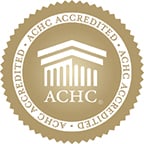 Graphic reads: ACHC Accredited | Imagery: Gold-filled circle with Parthenon illustration